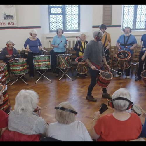 Rainbow Singers with drums