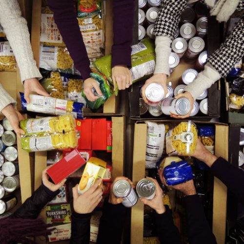 Giving out food at a Foodbank