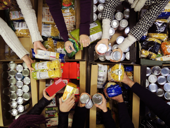 Giving out food at a Foodbank