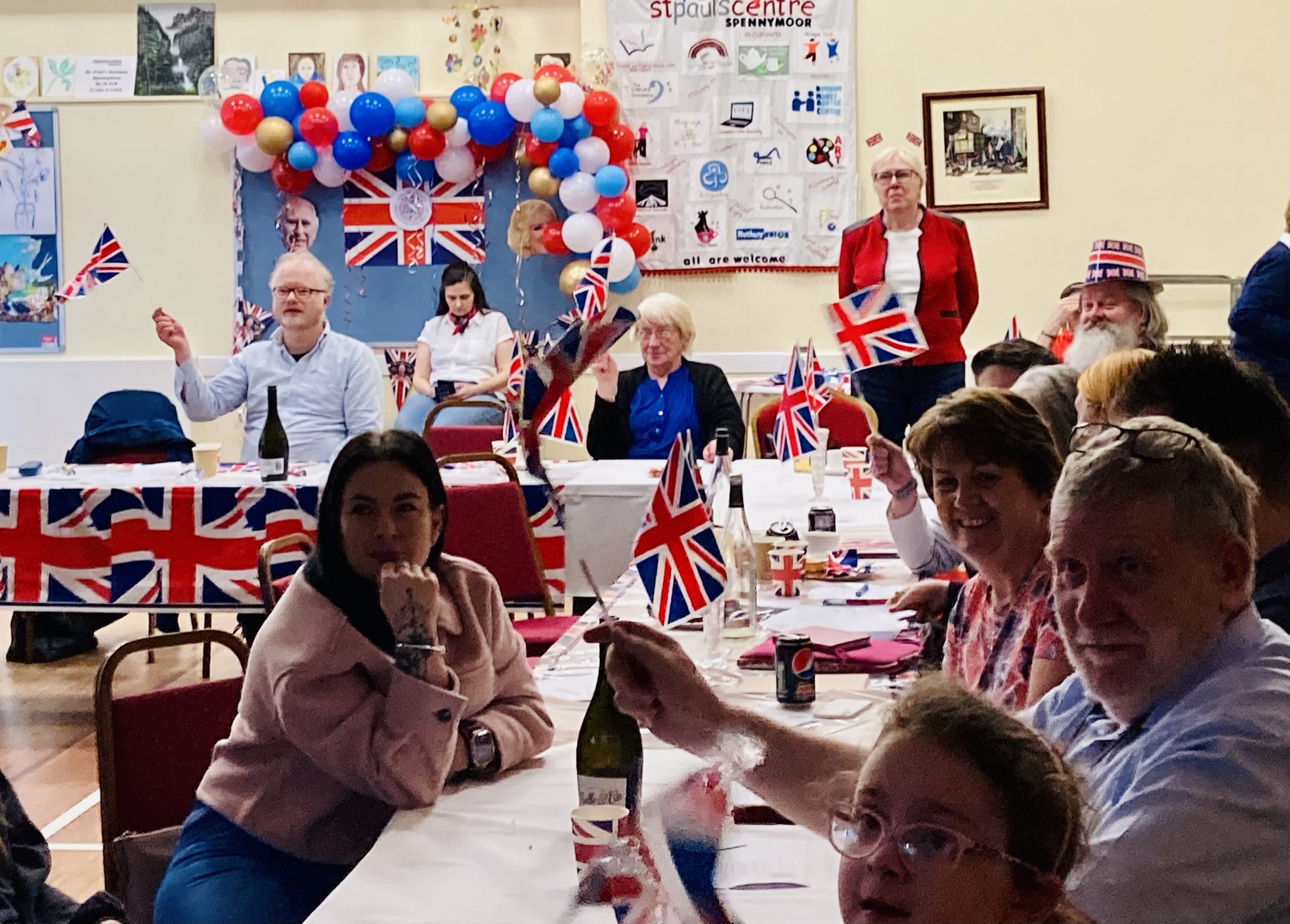 Flag-waving at the Coronation indoor street party